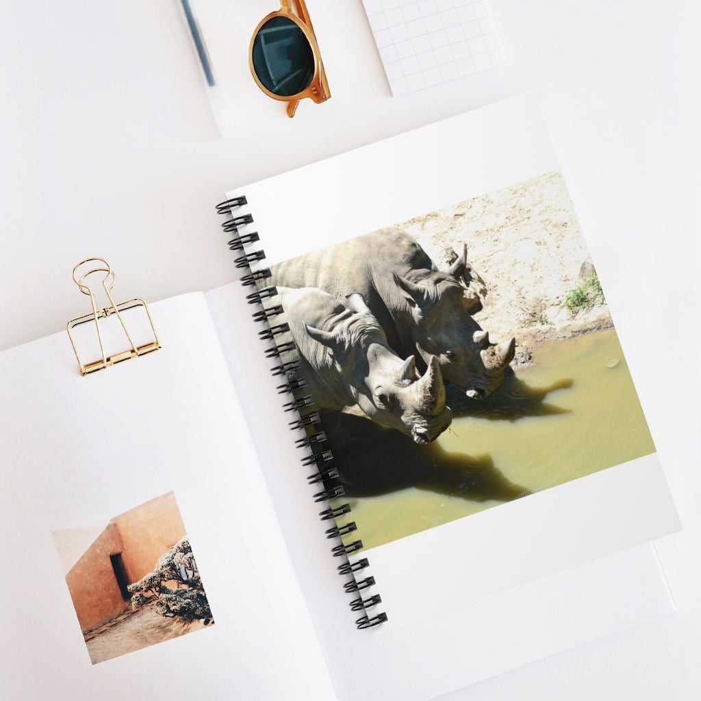 Rhinos Spiral Notebook featuring a colorful printed cover and ruled line pages, perfect for notes and lists.