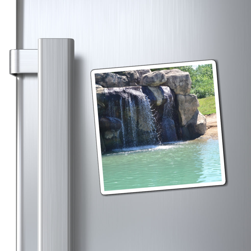 A set of Rock Waterfall Magnets showcasing various sizes and a sleek black backing, ideal for displaying messages on metallic surfaces.