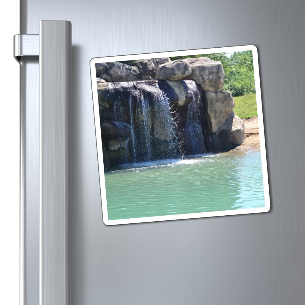 A set of Rock Waterfall Magnets showcasing various sizes and a sleek black backing, ideal for displaying messages on metallic surfaces.