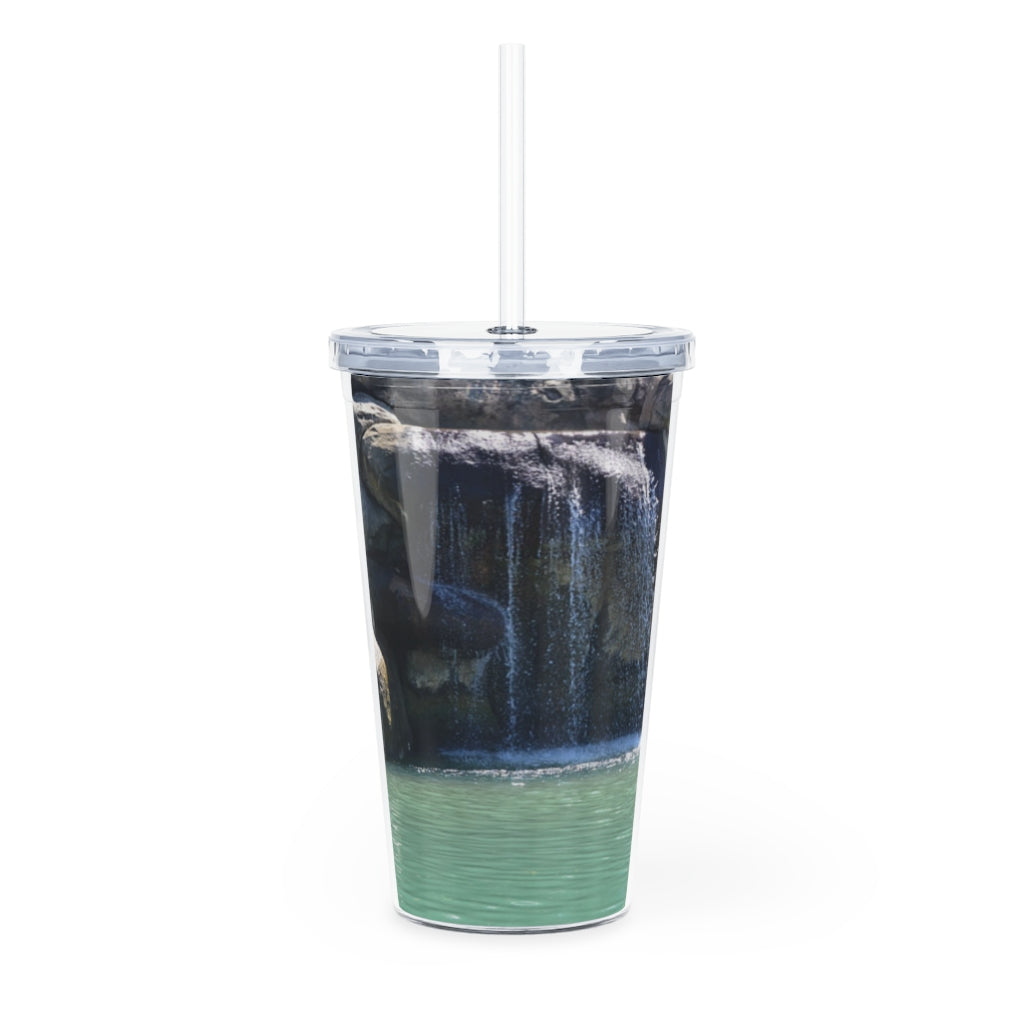 Rock Waterfall Plastic Tumbler with Straw featuring a vibrant design, lid, and reusable straw, perfect for drinks at events.