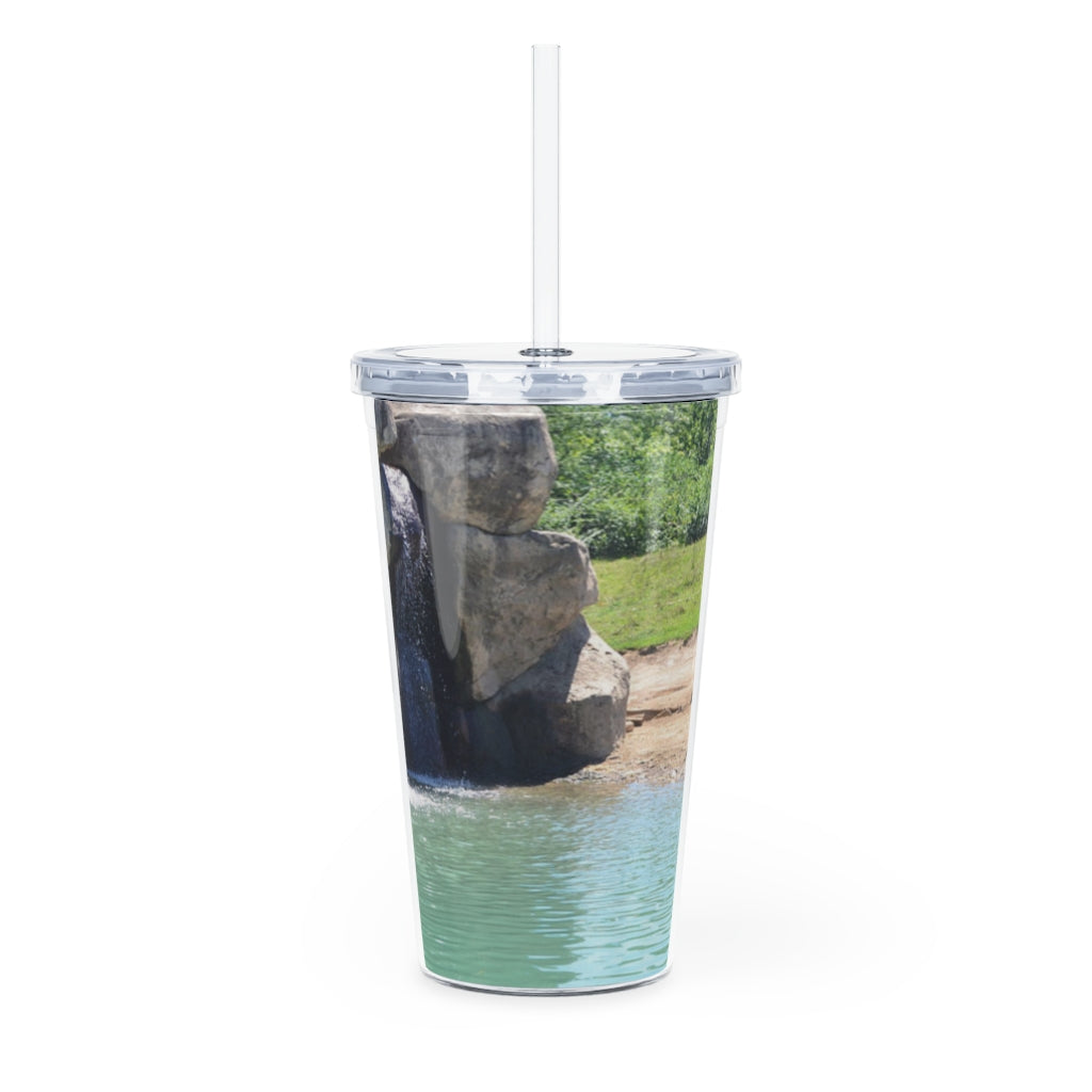 Rock Waterfall Plastic Tumbler with Straw featuring a vibrant design, lid, and reusable straw, perfect for drinks at events.