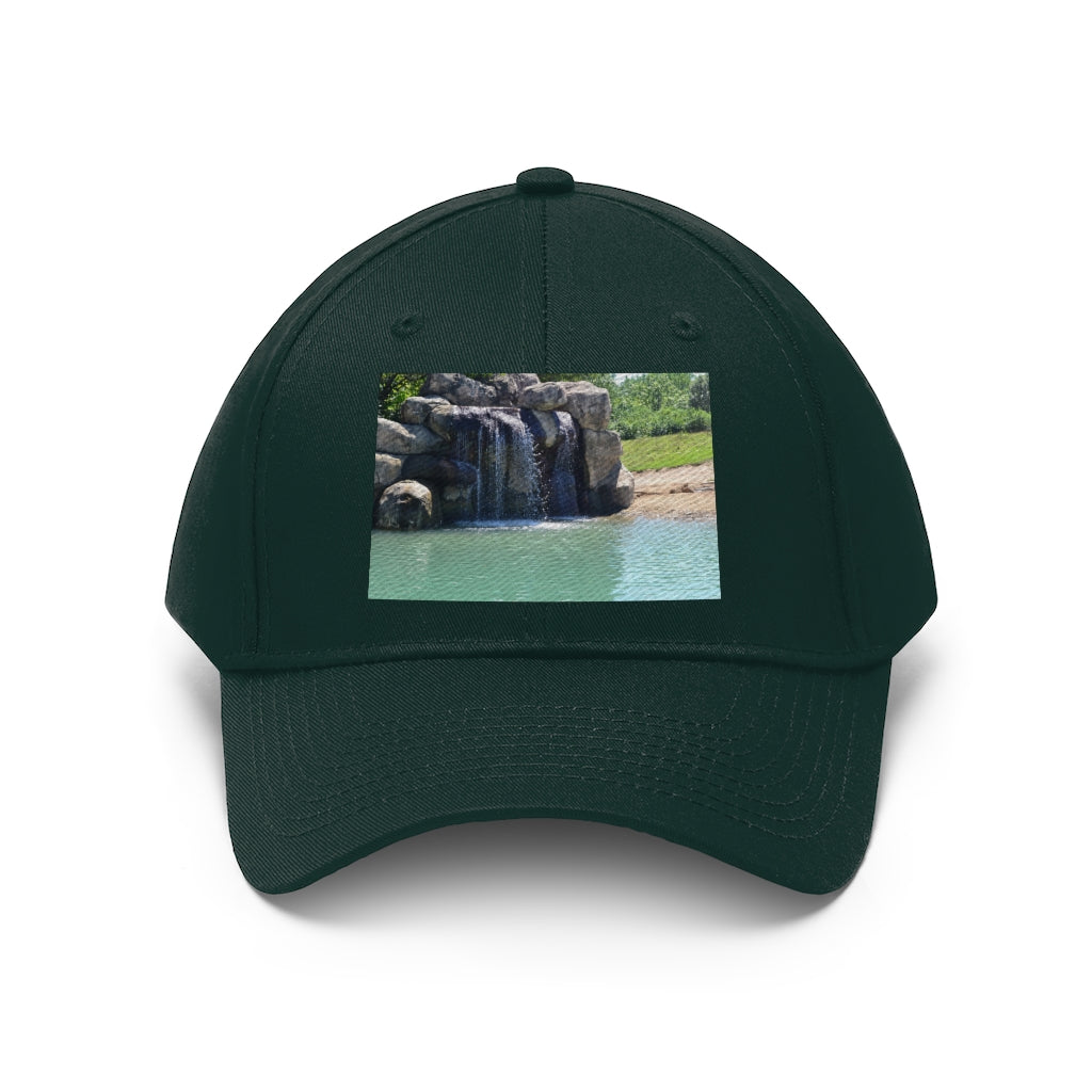 Rock Waterfall Unisex Twill Hat in cotton twill fabric, featuring a classic 6-panel design and adjustable Velcro closure.