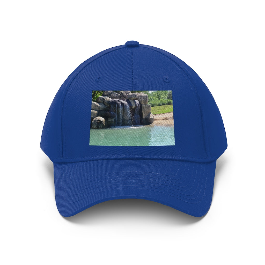 Rock Waterfall Unisex Twill Hat in cotton twill fabric, featuring a classic 6-panel design and adjustable Velcro closure.