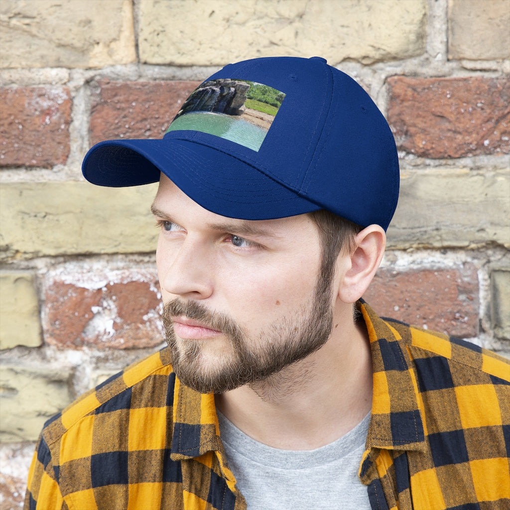 Rock Waterfall Unisex Twill Hat in cotton twill fabric, featuring a classic 6-panel design and adjustable Velcro closure.