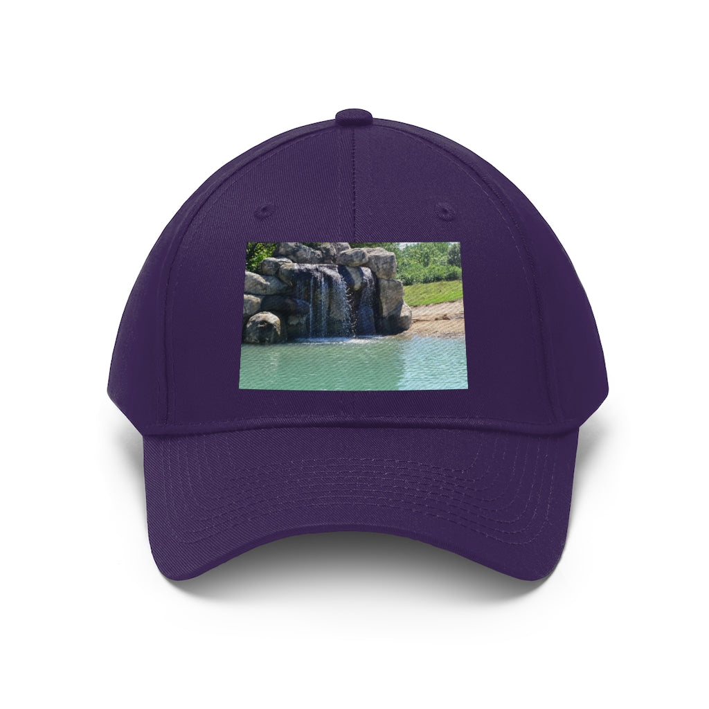 Rock Waterfall Unisex Twill Hat in cotton twill fabric, featuring a classic 6-panel design and adjustable Velcro closure.