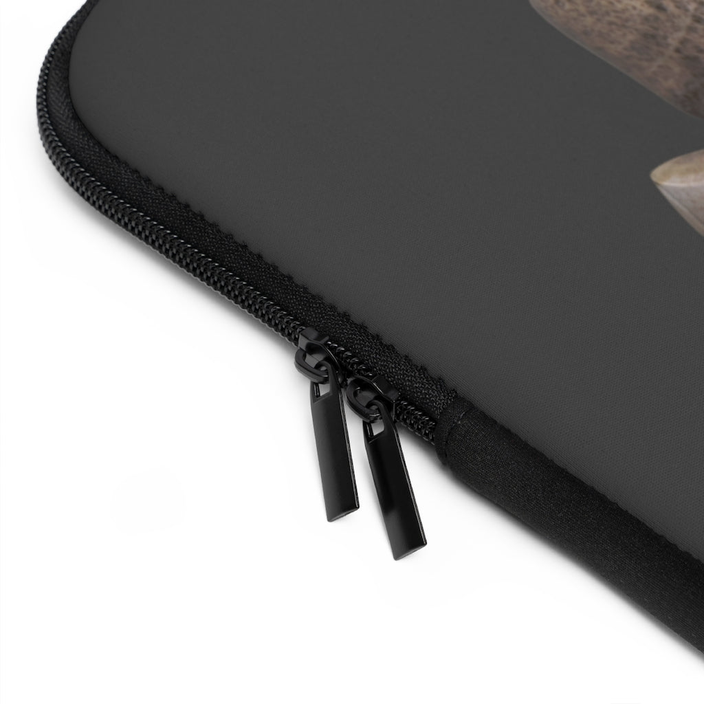 Rocks Laptop Sleeve featuring a customizable front design and solid black back, made from smooth neoprene material.