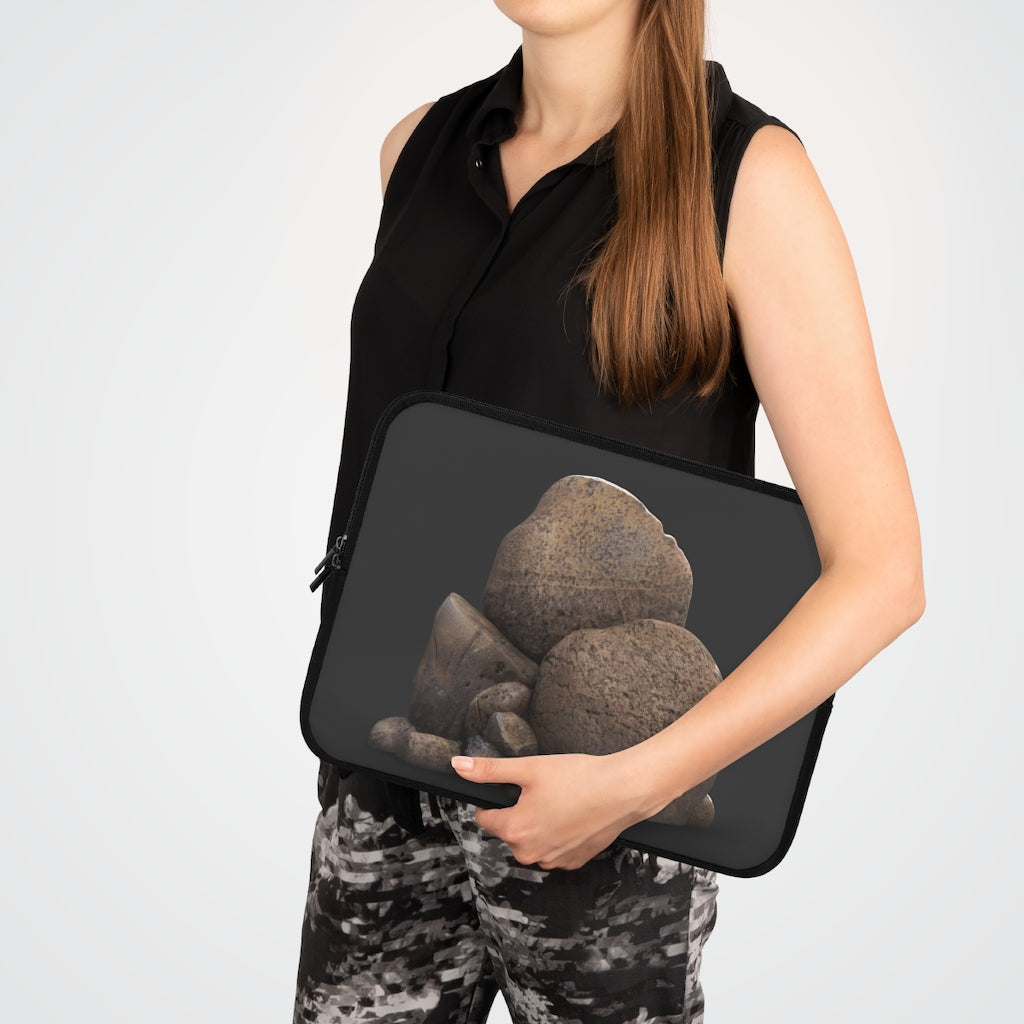 Rocks Laptop Sleeve featuring a customizable front design and solid black back, made from smooth neoprene material.