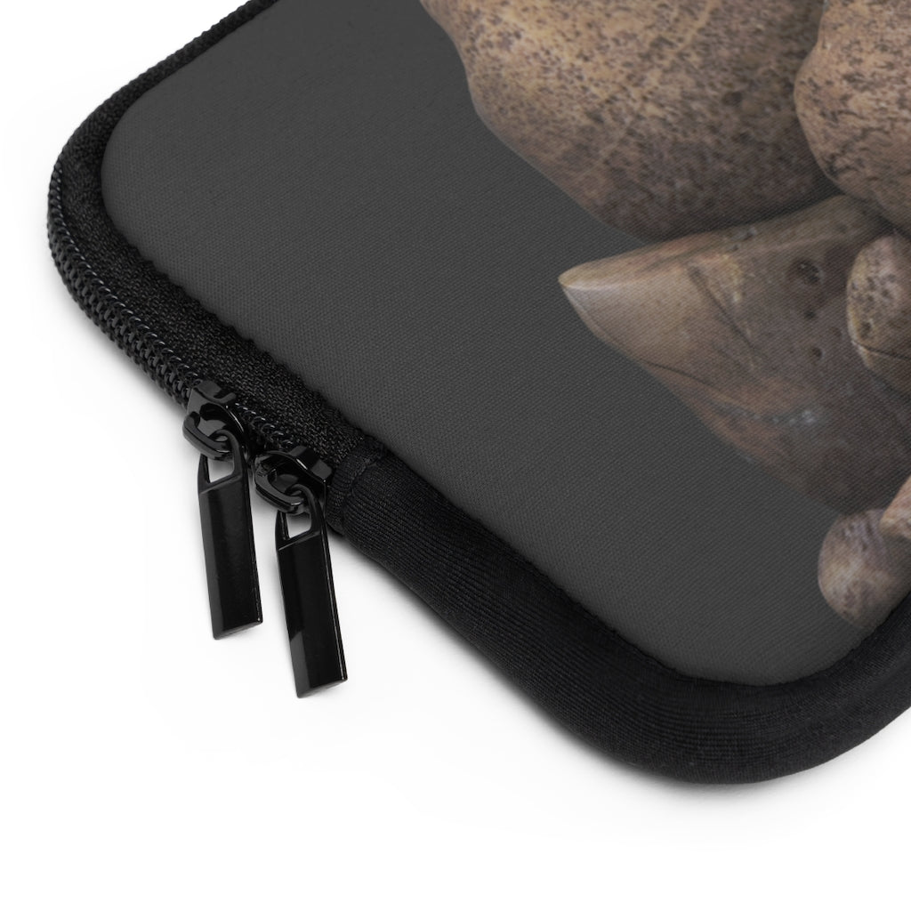 Rocks Laptop Sleeve featuring a customizable front design and solid black back, made from smooth neoprene material.