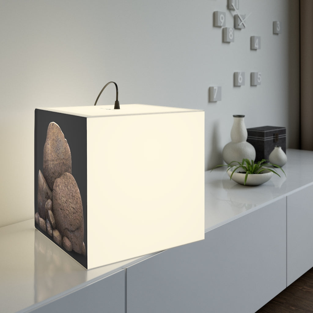 A stylish Rocks Personalized Lamp in a cube shape, showcasing its unique design and customizable lighting options, perfect for home decor.