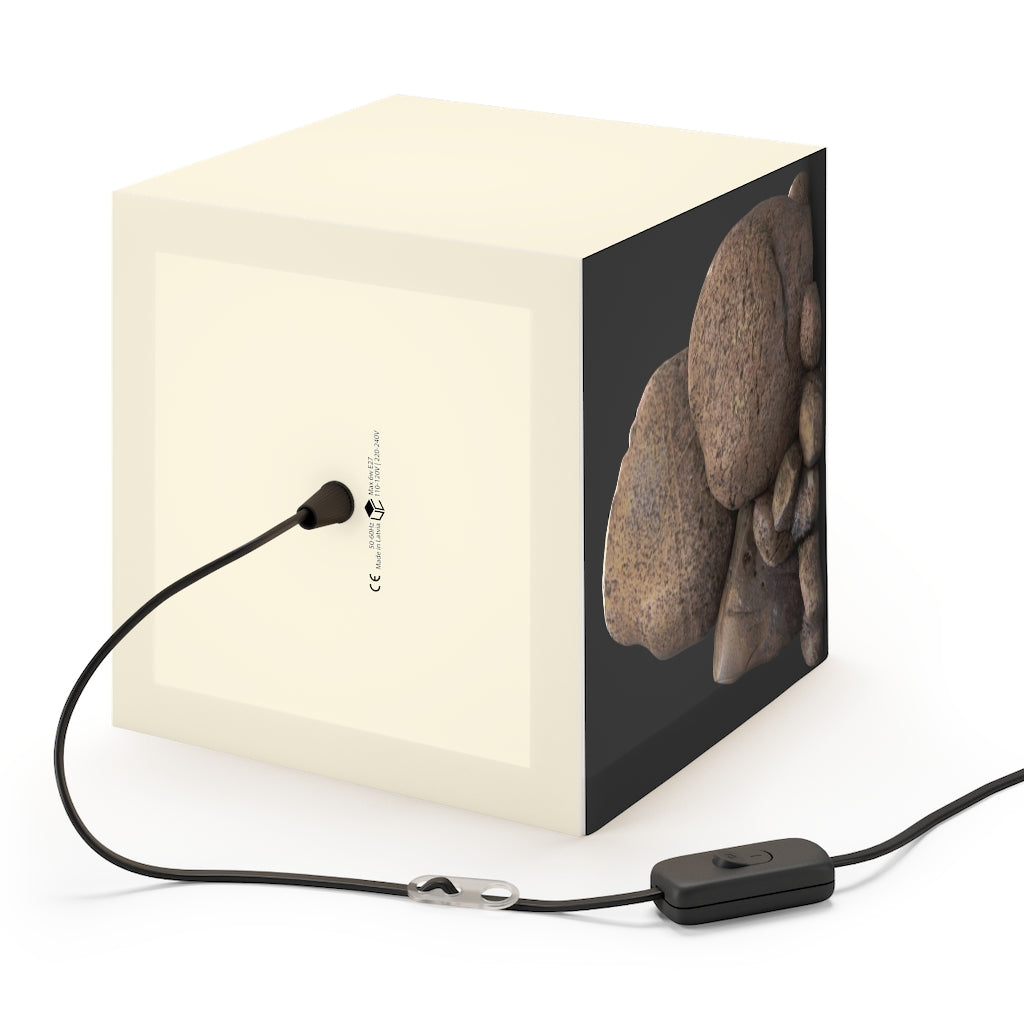 A stylish Rocks Personalized Lamp in a cube shape, showcasing its unique design and customizable lighting options, perfect for home decor.