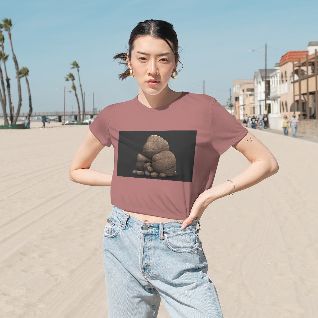 Rocks Women's Flowy Cropped Tee in various colors, showcasing its lightweight fabric and stylish design.