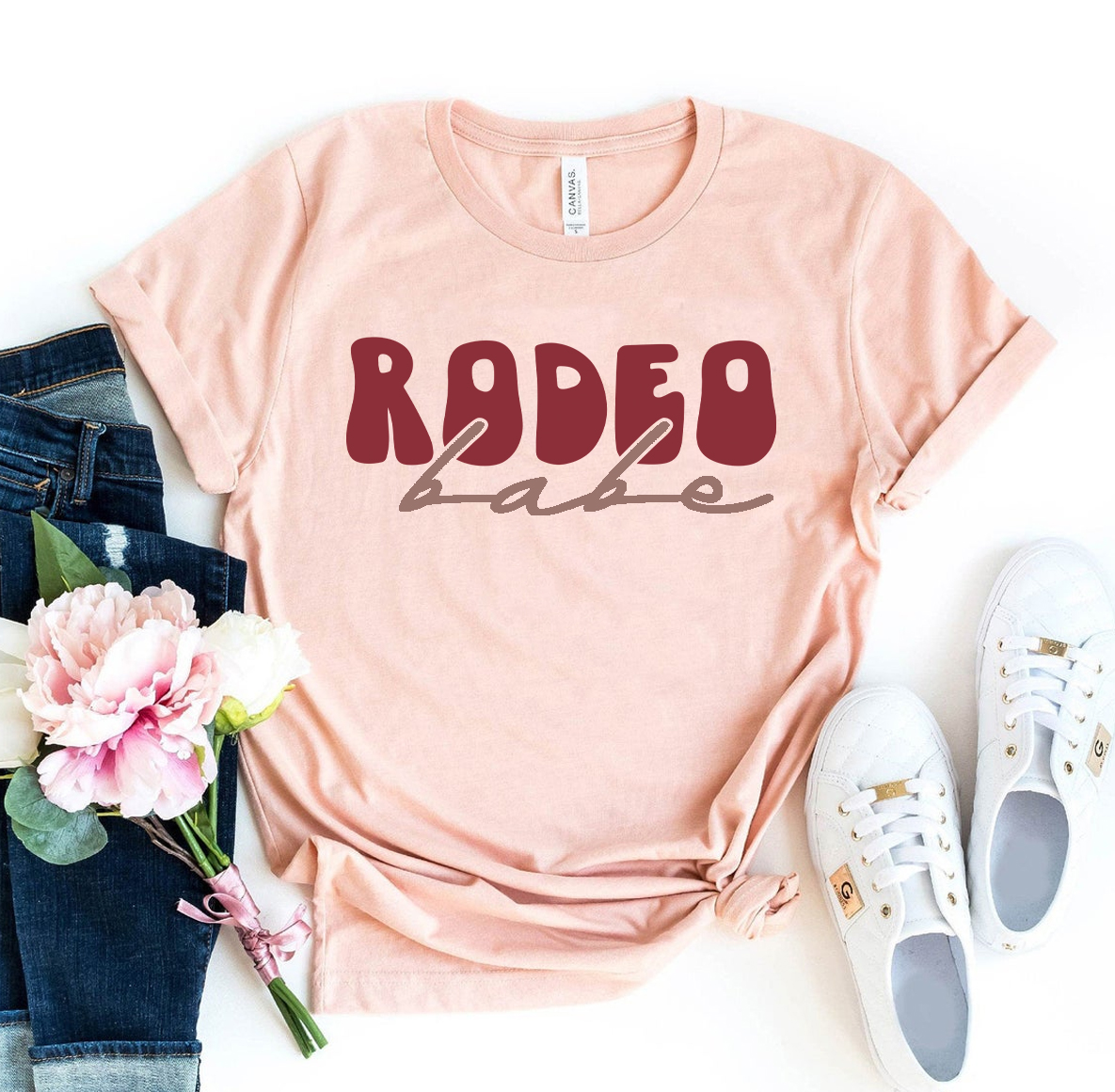 Rodeo Babe T-shirt made of premium ring spun cotton, featuring a vibrant flex print design, available in various sizes.