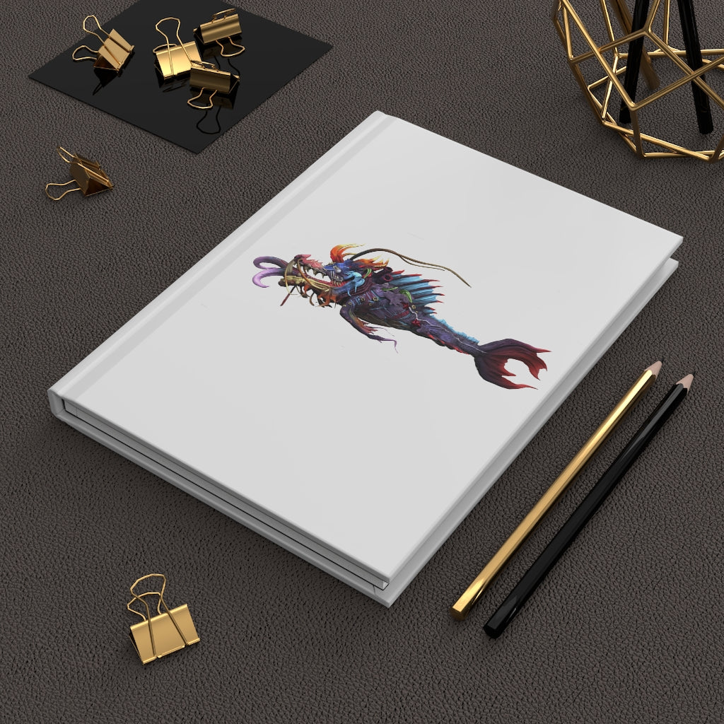 Ryuuk the Fish Dragon God hardcover journal with a matte finish, featuring a vibrant wraparound design and lined pages.