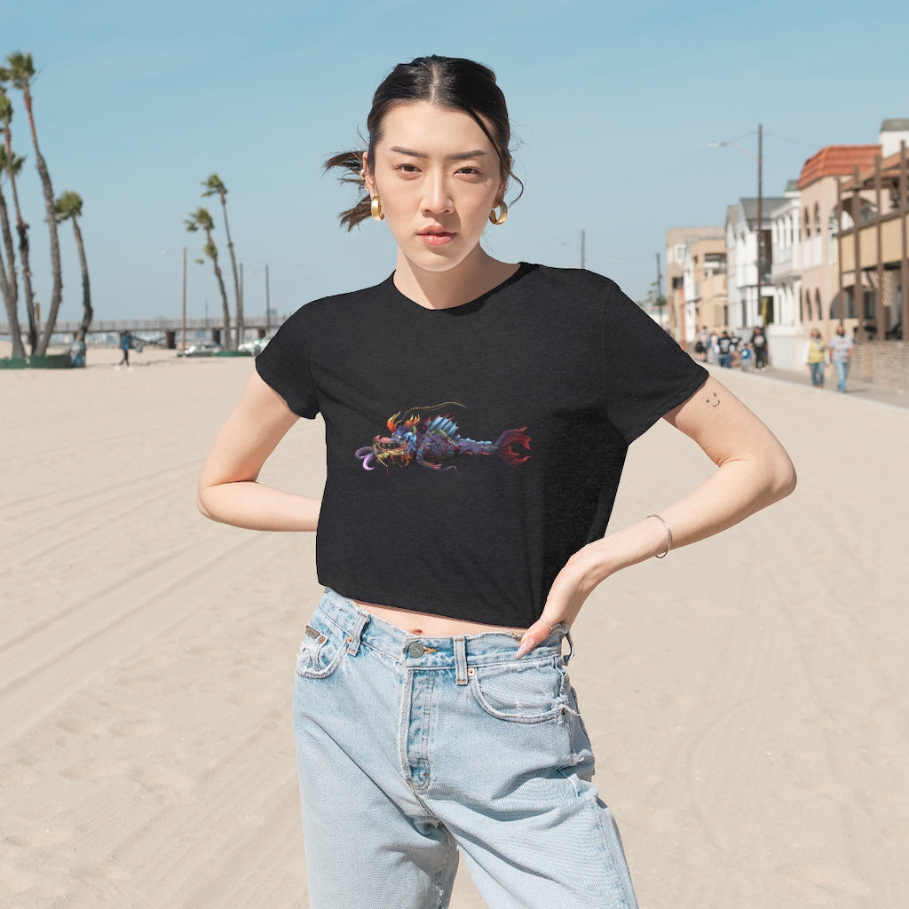 Ryuuk the Fish Dragon God Women's Flowy Cropped Tee featuring a unique design, lightweight fabric, and a stylish cropped fit.