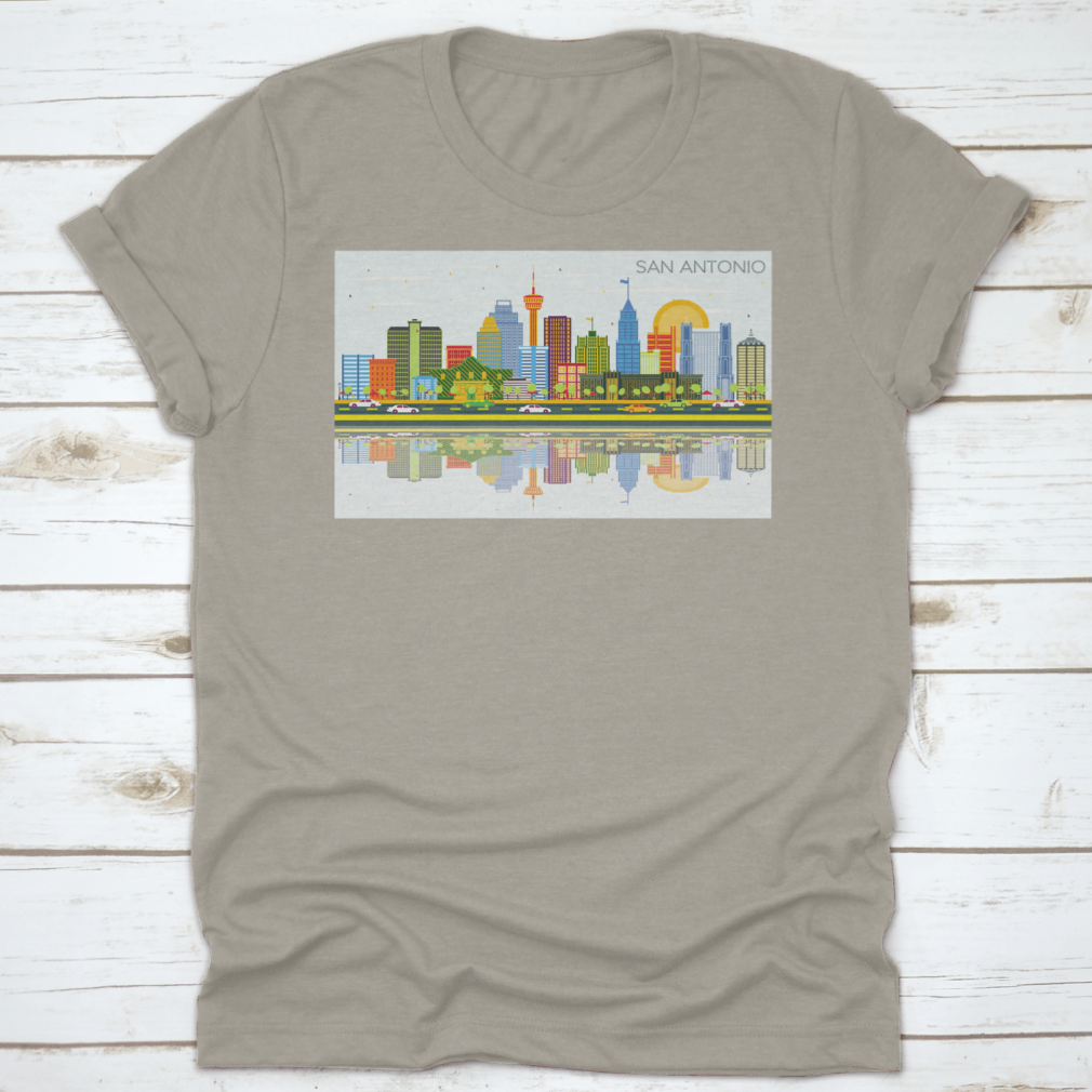 A vibrant t-shirt featuring the San Antonio Texas skyline with colorful buildings against a bright blue sky.