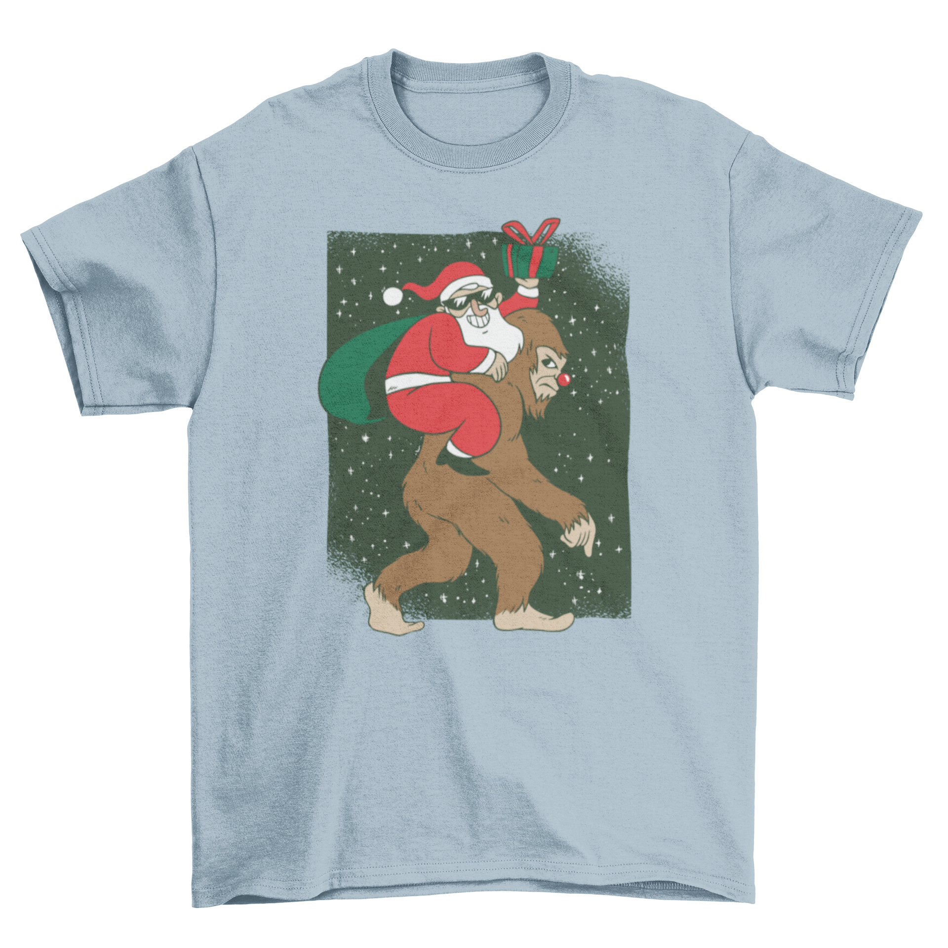 A humorous T-shirt featuring Santa Claus riding Bigfoot, surrounded by colorful presents.