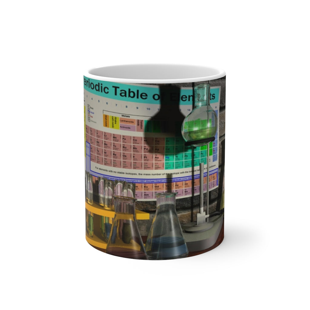 A white ceramic Science Scene Color Changing Mug displaying vibrant colors as it heats up, perfect for enjoying hot beverages.