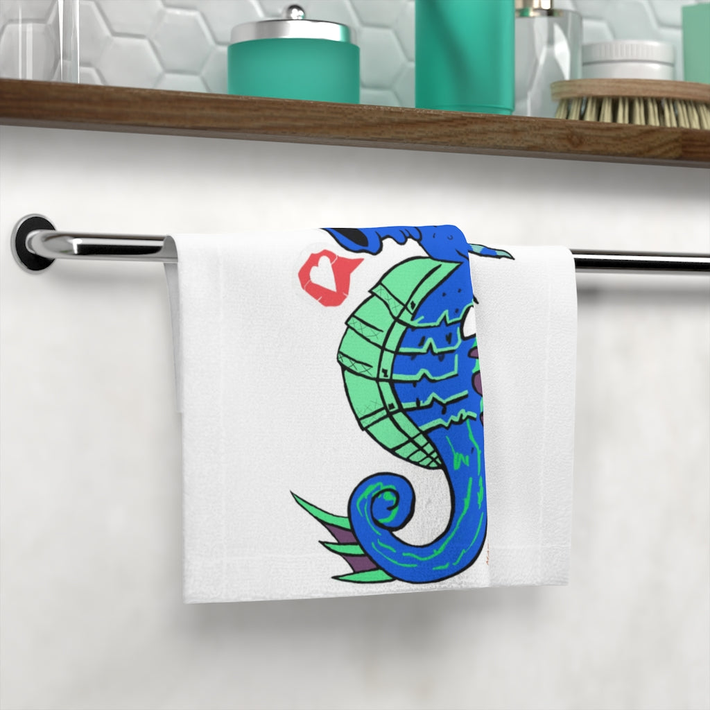 Scribblers the Seahorse Face Towel featuring a vibrant seahorse design on a soft polyester front and absorbent cotton back.