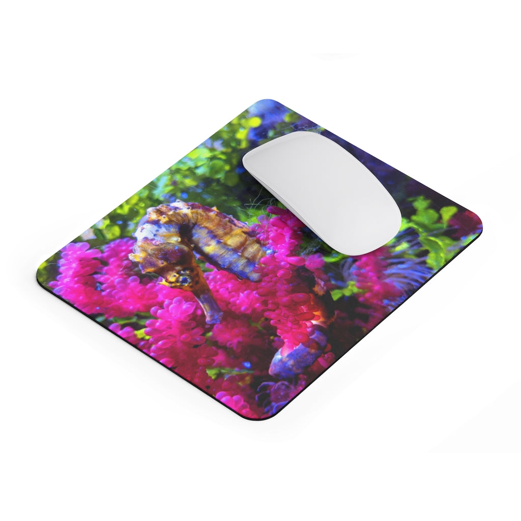 A colorful seahorse mouse pad featuring a vibrant design on a smooth neoprene surface, ideal for enhancing any desk.