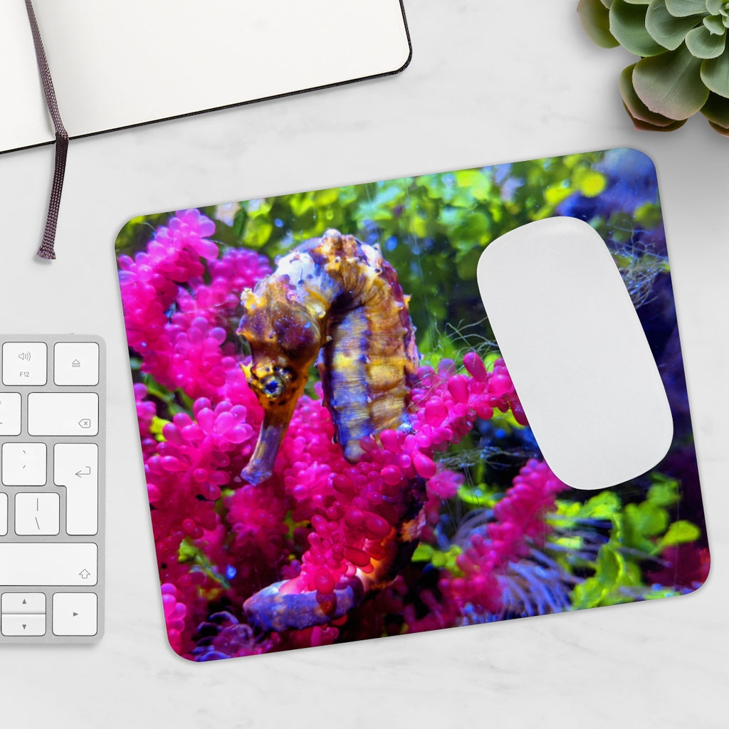 A colorful seahorse mouse pad featuring a vibrant design on a smooth neoprene surface, ideal for enhancing any desk.