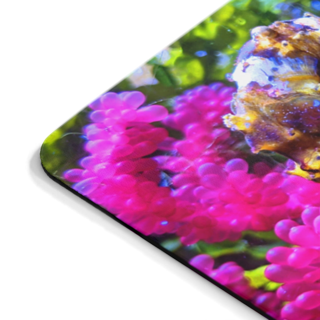 A colorful seahorse mouse pad featuring a vibrant design on a smooth neoprene surface, ideal for enhancing any desk.