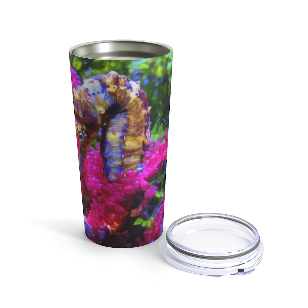 Seahorse Tumbler 20oz in stainless steel with a see-thru plastic lid, showcasing its sleek design and rounded corners.