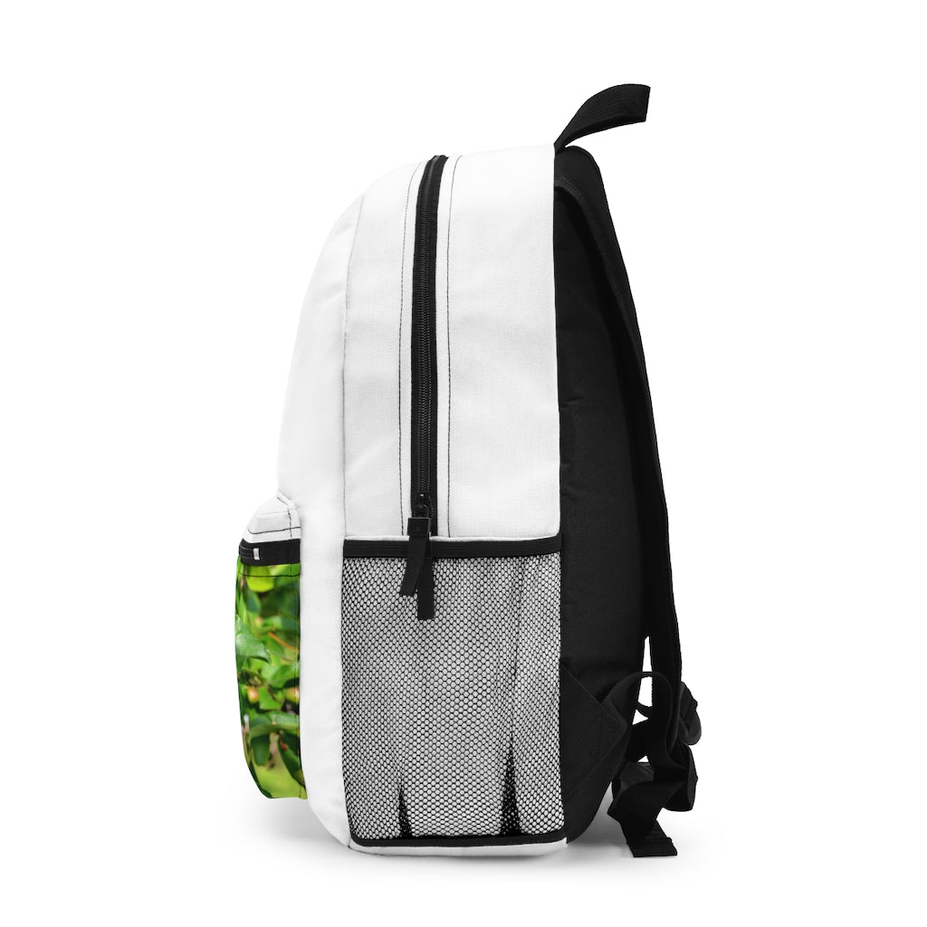 Seeds and Green Leaves Backpack made from durable spun polyester, featuring adjustable straps and a custom name tag.