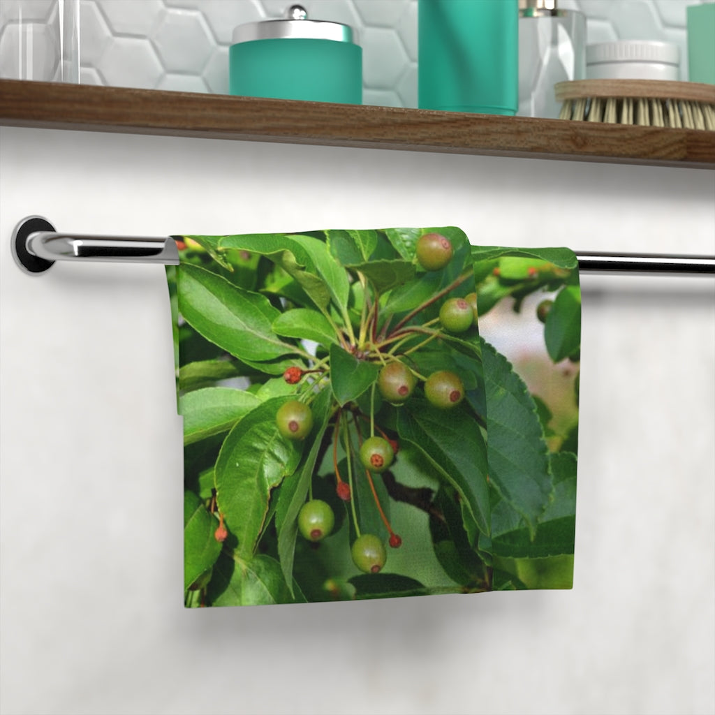 Seeds and Green Leaves Face Towel featuring a vibrant printed front and soft cotton back, ideal for personal use or customization.