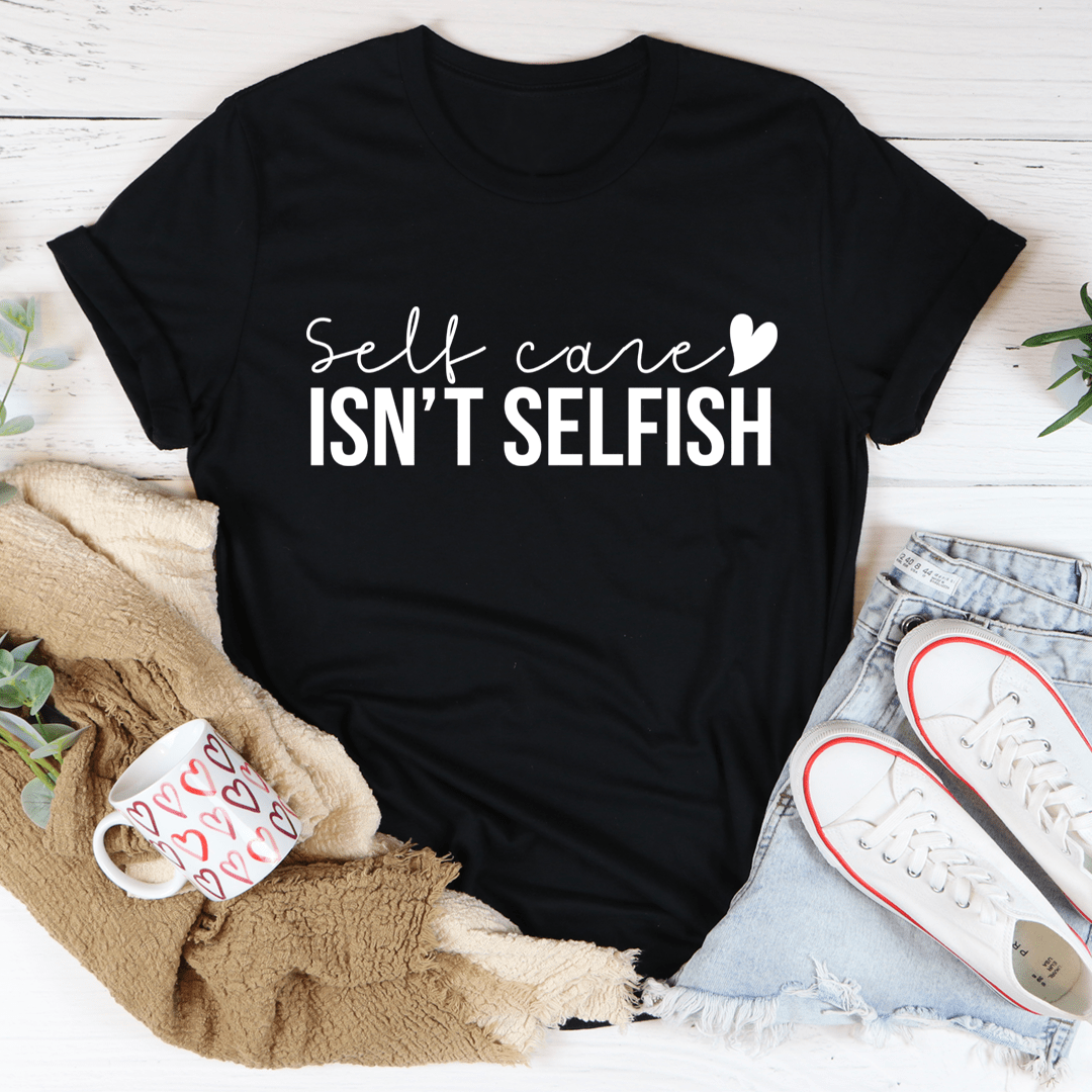 A comfortable and stylish 'Self Care Isn't Selfish' T-Shirt made from soft ring-spun cotton, featuring a durable design and a positive message.