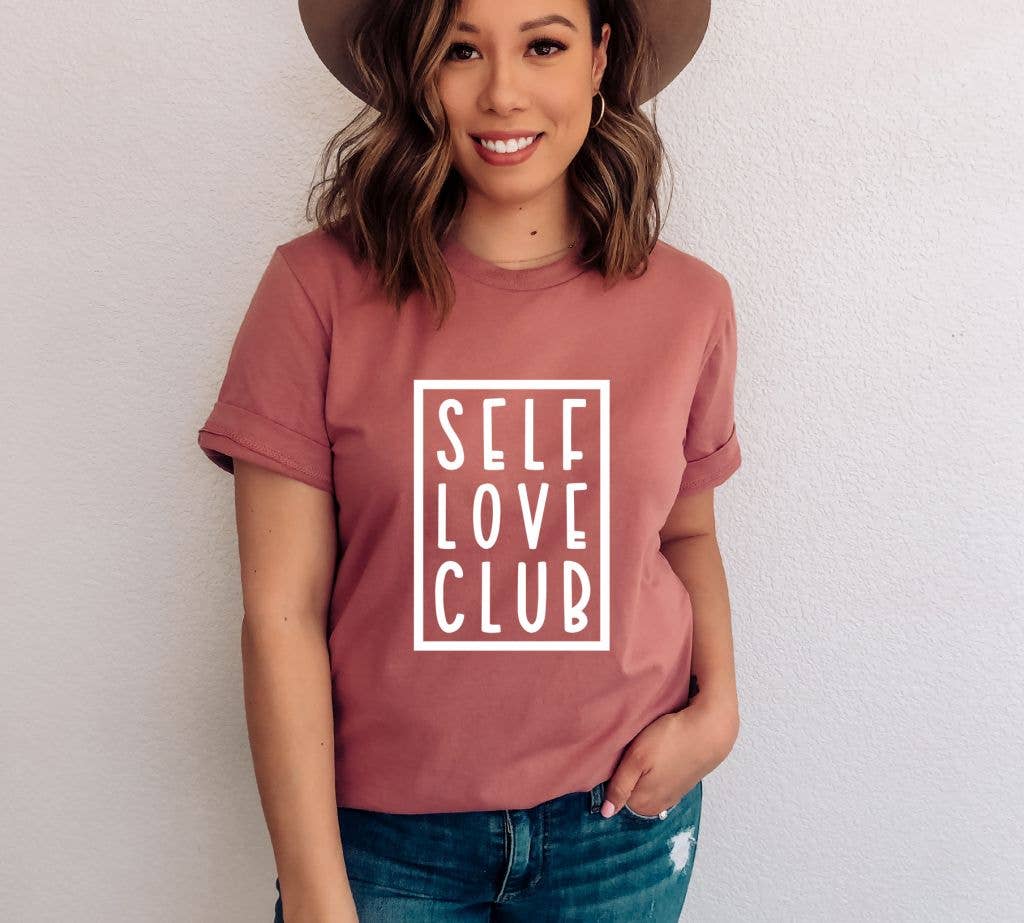 Self Love Club T-shirt made of premium ring spun cotton, featuring a vibrant print and available in various sizes.