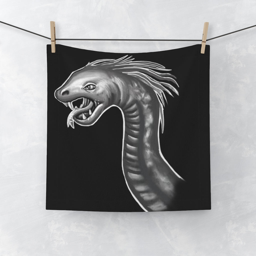 A Serpent Face Towel featuring a vibrant custom design on a soft polyester front and absorbent cotton back, measuring 13x13 inches.