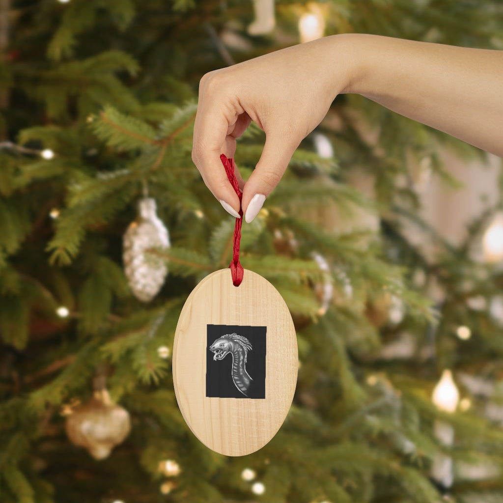 Serpent Wooden Christmas Ornaments in various whimsical shapes, showcasing rustic wood finish and red ribbons for hanging.