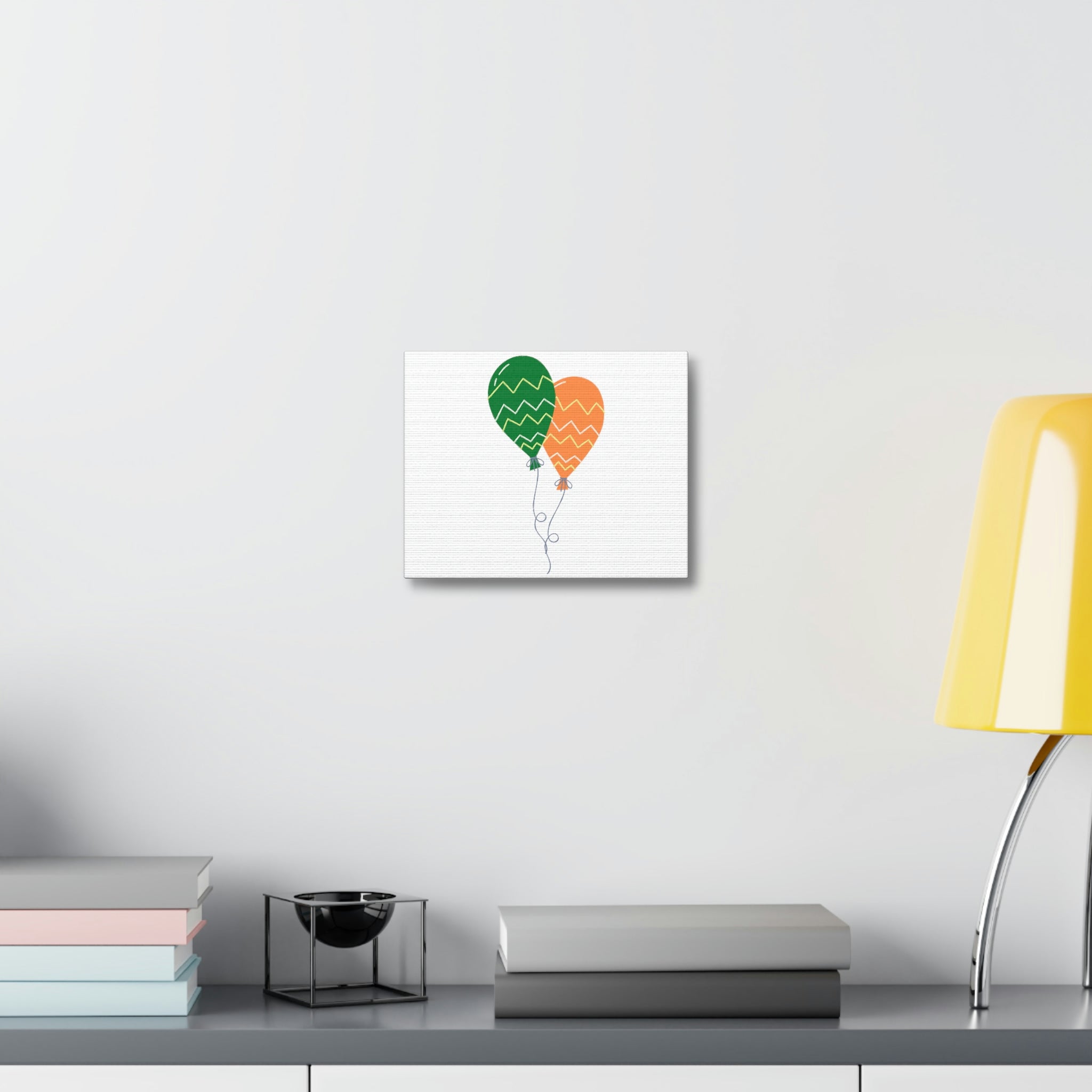 A colorful set of balloons printed on a stretched canvas, showcasing vibrant hues and high-quality details, framed on a sturdy wooden structure.