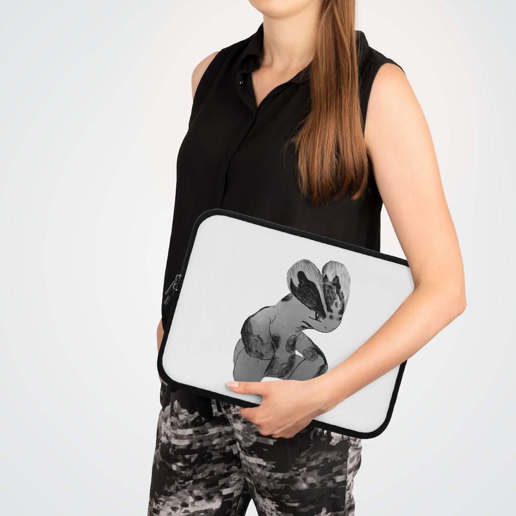 Shamrock Laptop Sleeve featuring a customizable front design and black polyester back, showcasing its water-resistant and durable construction.