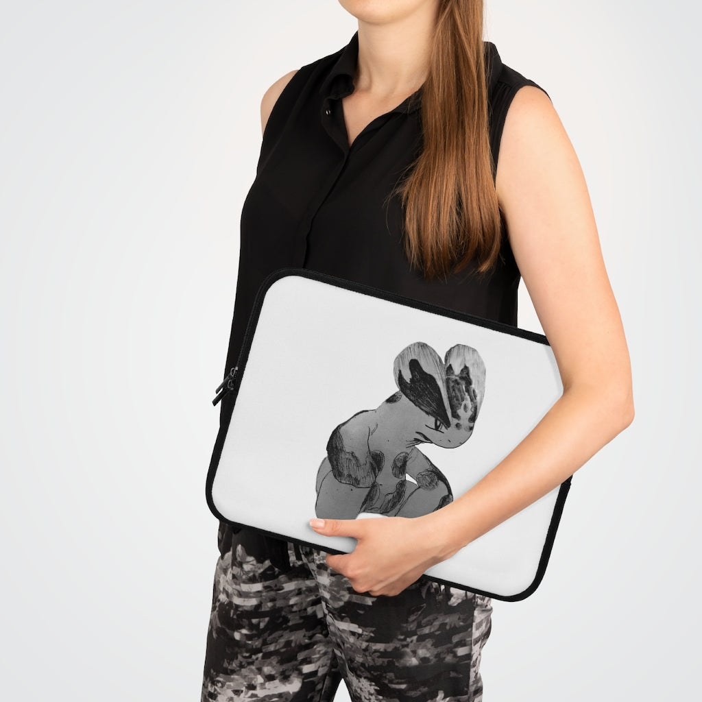 Shamrock Laptop Sleeve featuring a customizable front design and black polyester back, showcasing its water-resistant and durable construction.