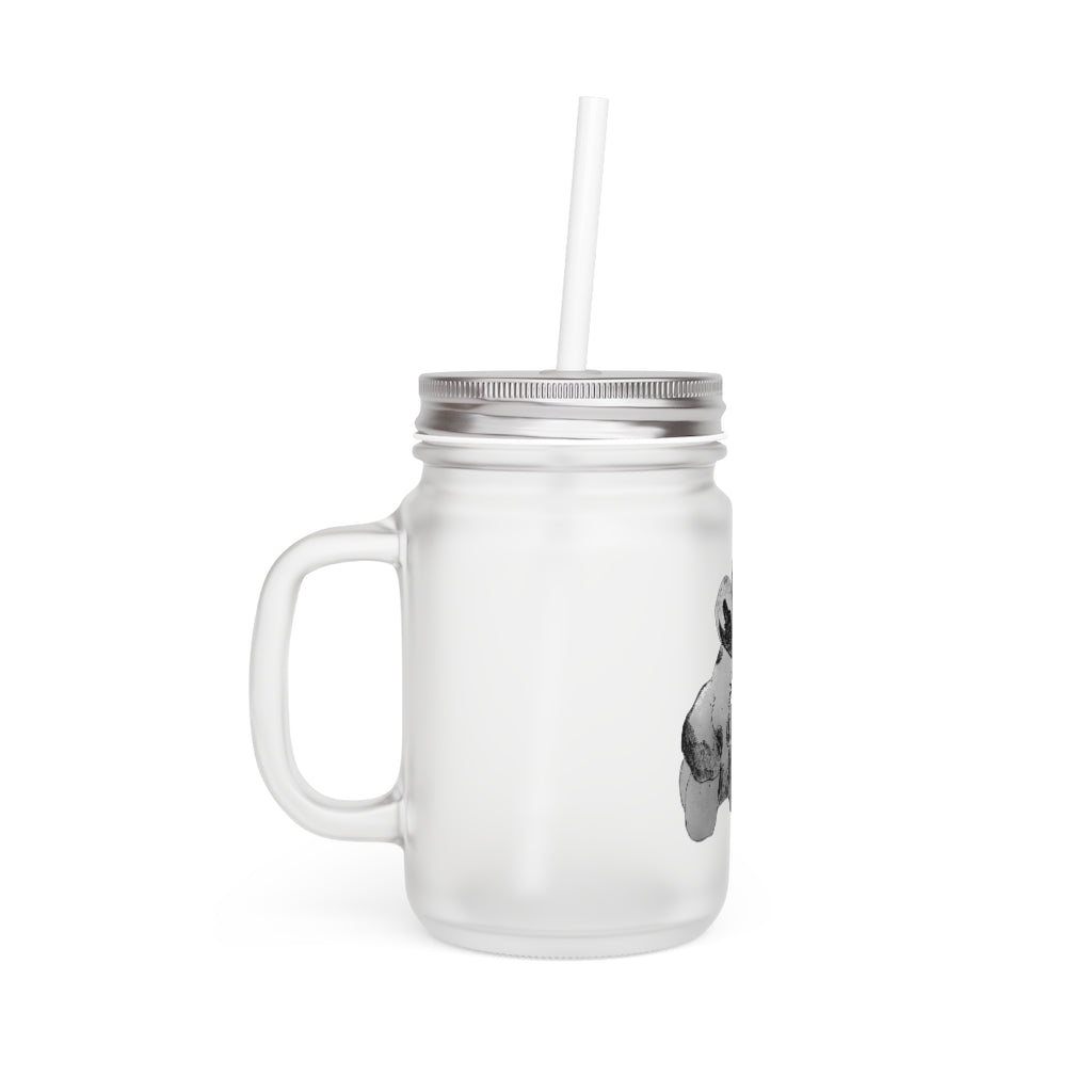 A personalized Shamrock Mason Jar made of frosted glass, featuring a straw and lid, ideal for drinks.