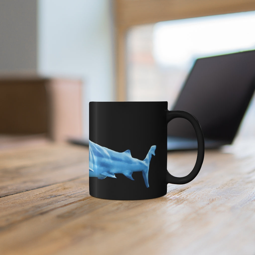 Shark 11oz Black Mug with a sleek design, perfect for coffee, tea, or hot chocolate, featuring a comfortable C-handle.