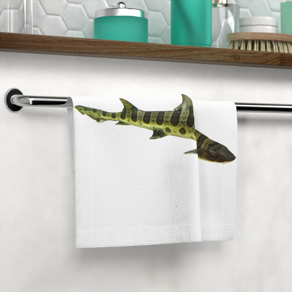 A vibrant Shark Face Towel featuring a playful shark design on a soft polyester front and absorbent cotton back, perfect for bathroom use.