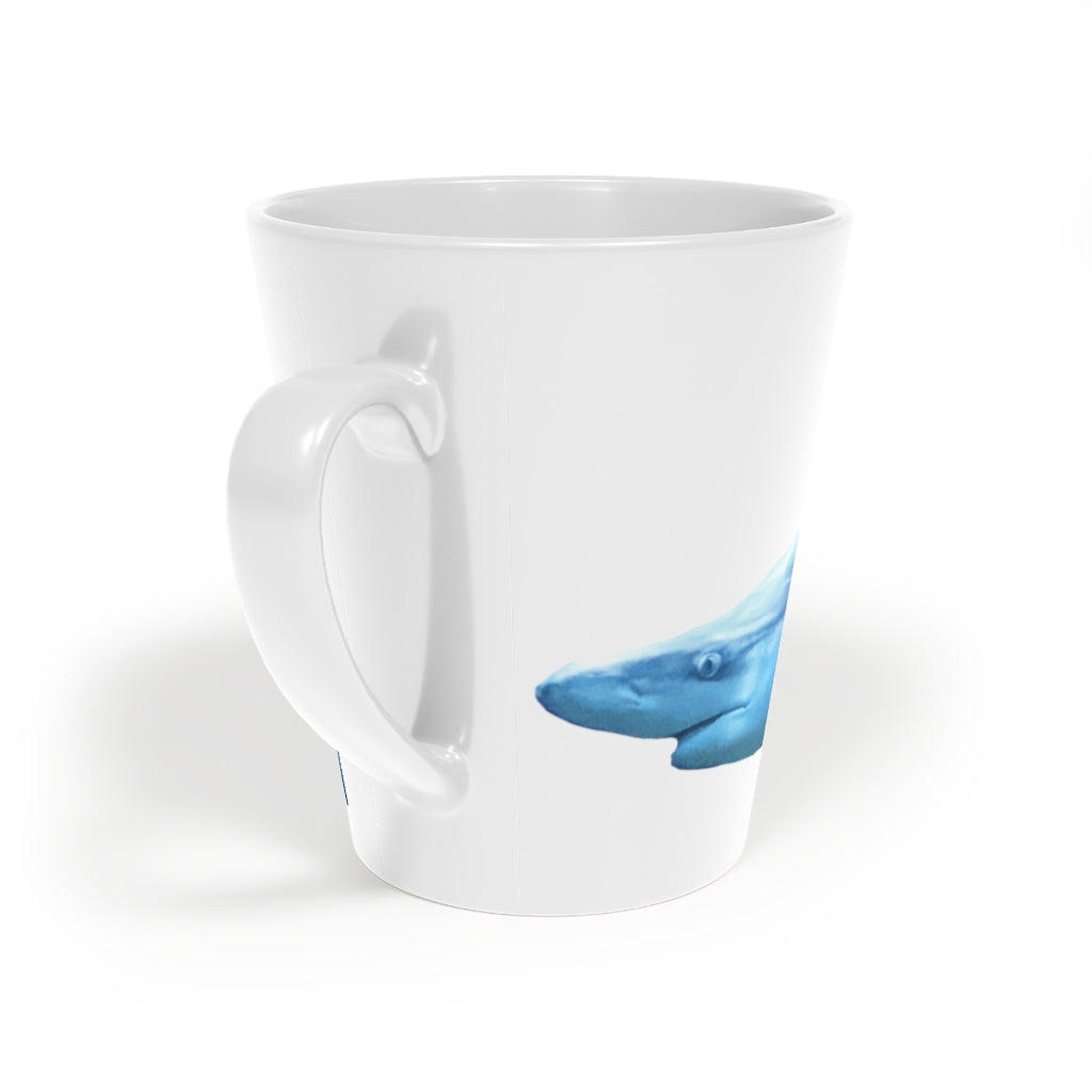 A stylish Shark Latte Mug with a durable white ceramic body and easy-grip handle, perfect for lattes and other beverages.