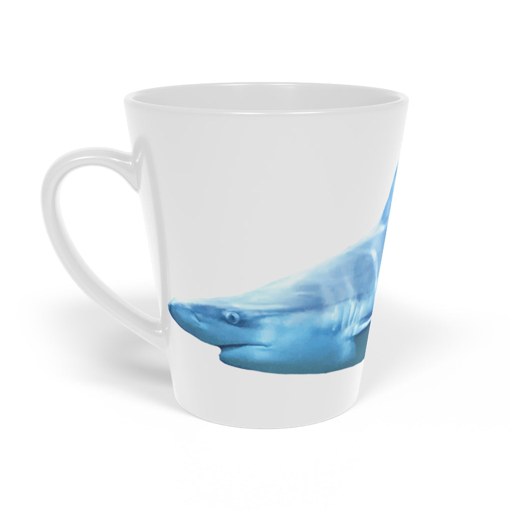 A stylish Shark Latte Mug with a durable white ceramic body and easy-grip handle, perfect for lattes and other beverages.