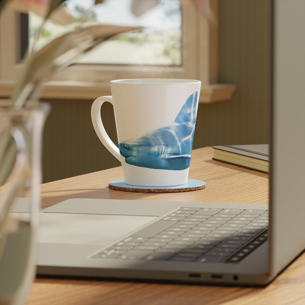 A stylish Shark Latte Mug with a durable white ceramic body and easy-grip handle, perfect for lattes and other beverages.