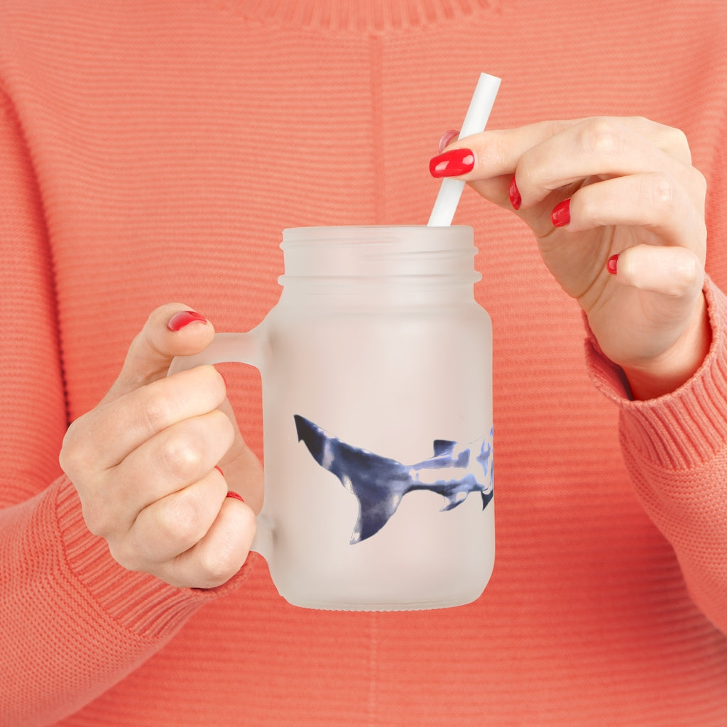 A stylish Shark Mason Jar made of frosted glass, featuring a straw and lid, perfect for personalized drinks.