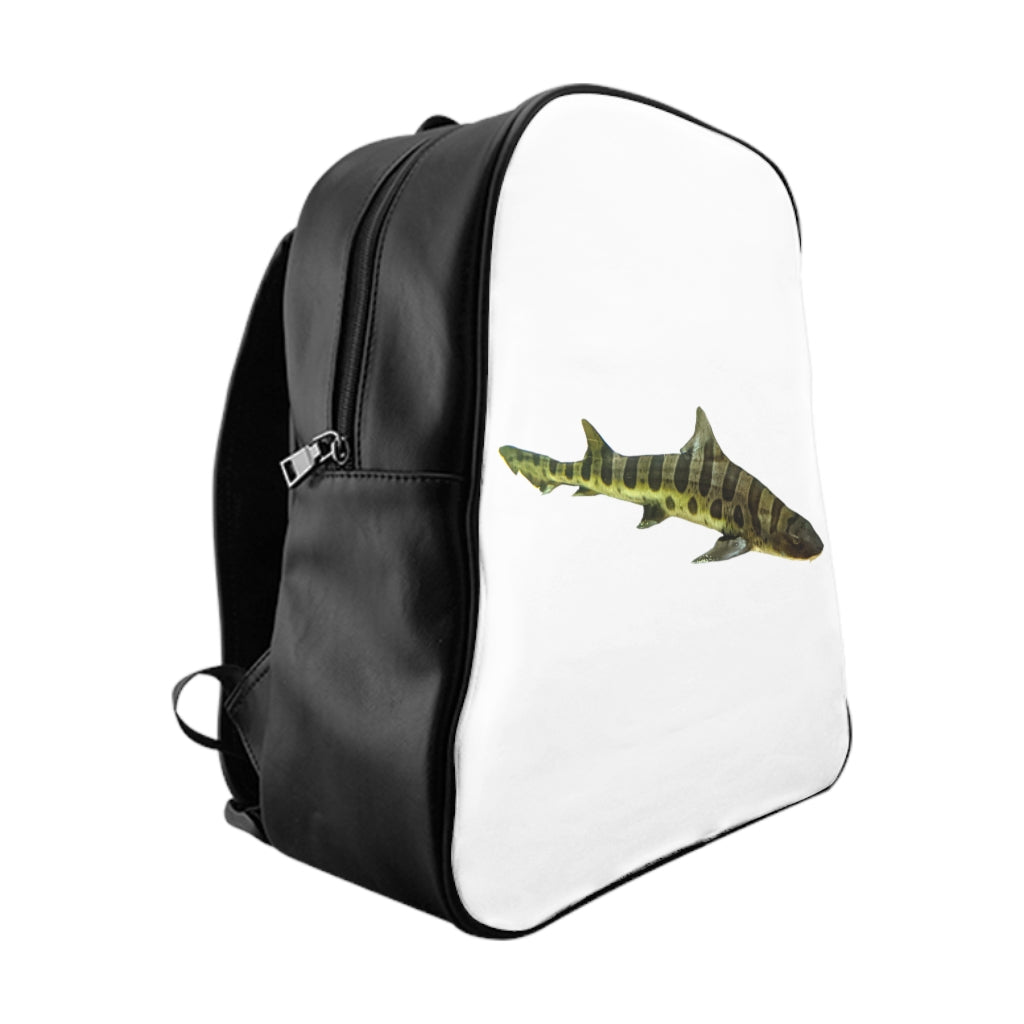 Shark School Backpack featuring a stylish shark design, padded back, and multiple inside pockets, perfect for school and everyday use.