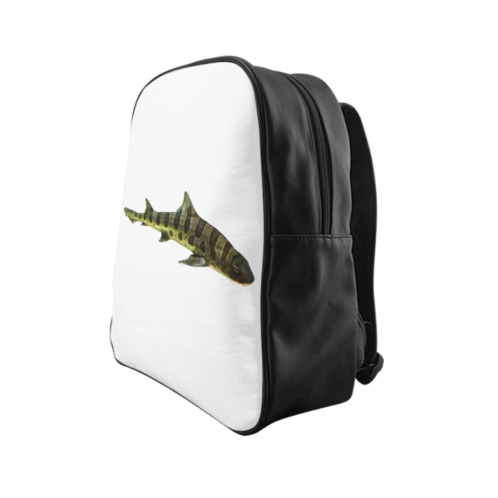 Shark School Backpack featuring a stylish shark design, padded back, and multiple inside pockets, perfect for school and everyday use.