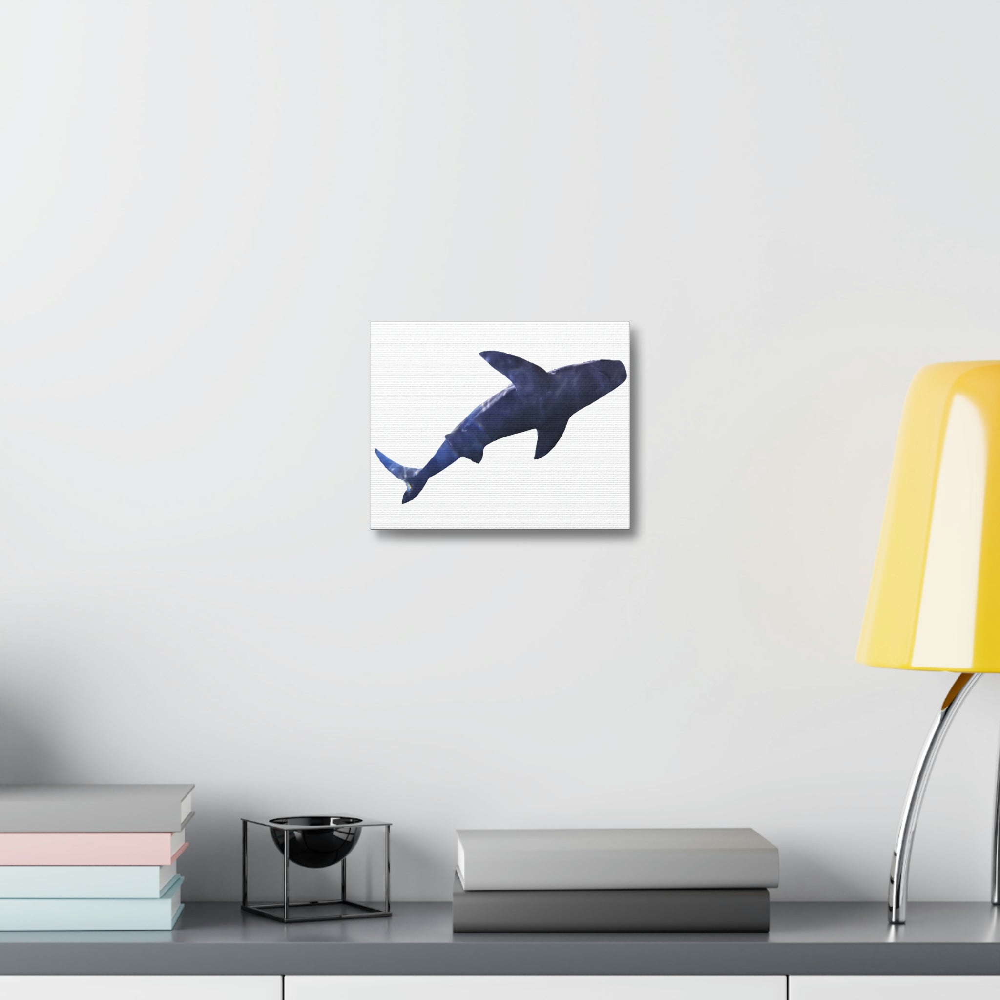 A vibrant Shark Stretched Canvas artwork displayed on a wall, showcasing high-quality print and a sturdy wooden frame.