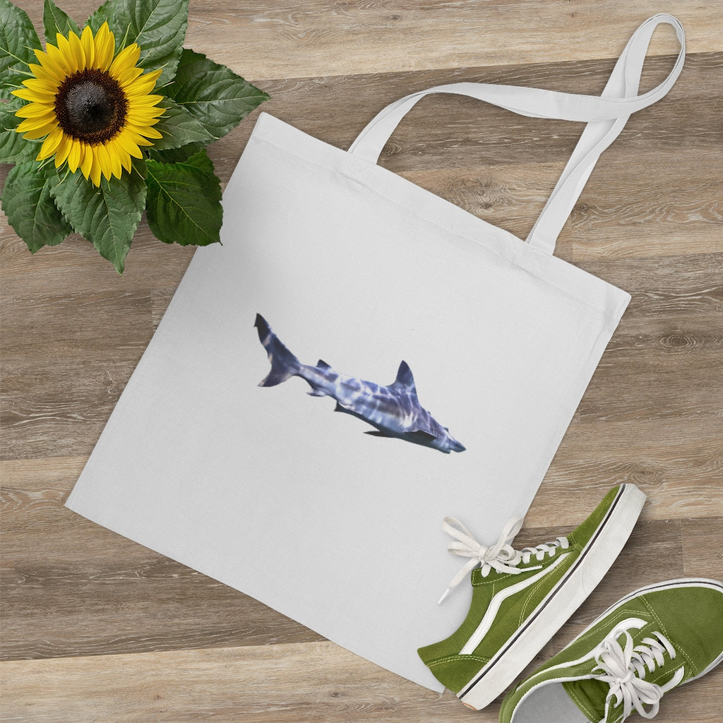 A stylish Shark Tote Bag made of 100% cotton with long handles and cross stitching, available in various colors.