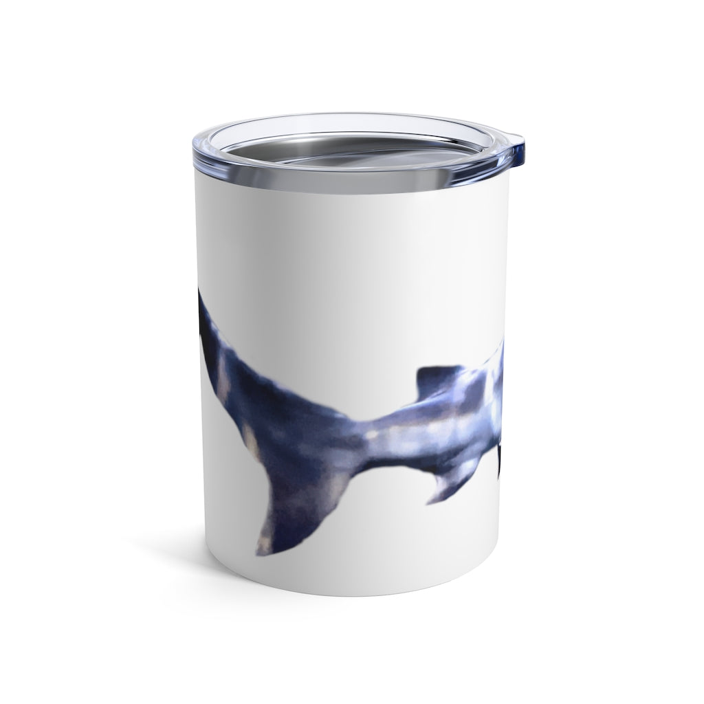 Shark Tumbler 10oz in stainless steel with a see-thru plastic lid, showcasing its sleek design and compact size.