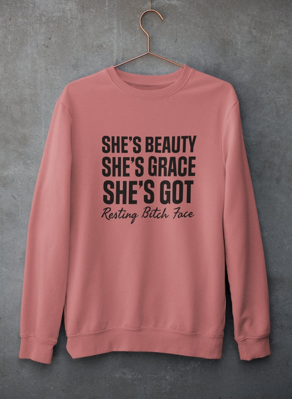 A stylish sweatshirt featuring the phrase 'She's Beauty She's Grace', made from a cozy cotton/poly fleece blend, perfect for casual wear.