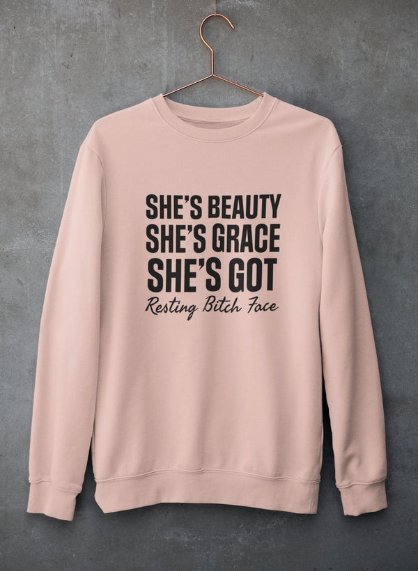 A stylish sweatshirt featuring the phrase 'She's Beauty She's Grace', made from a cozy cotton/poly fleece blend, perfect for casual wear.