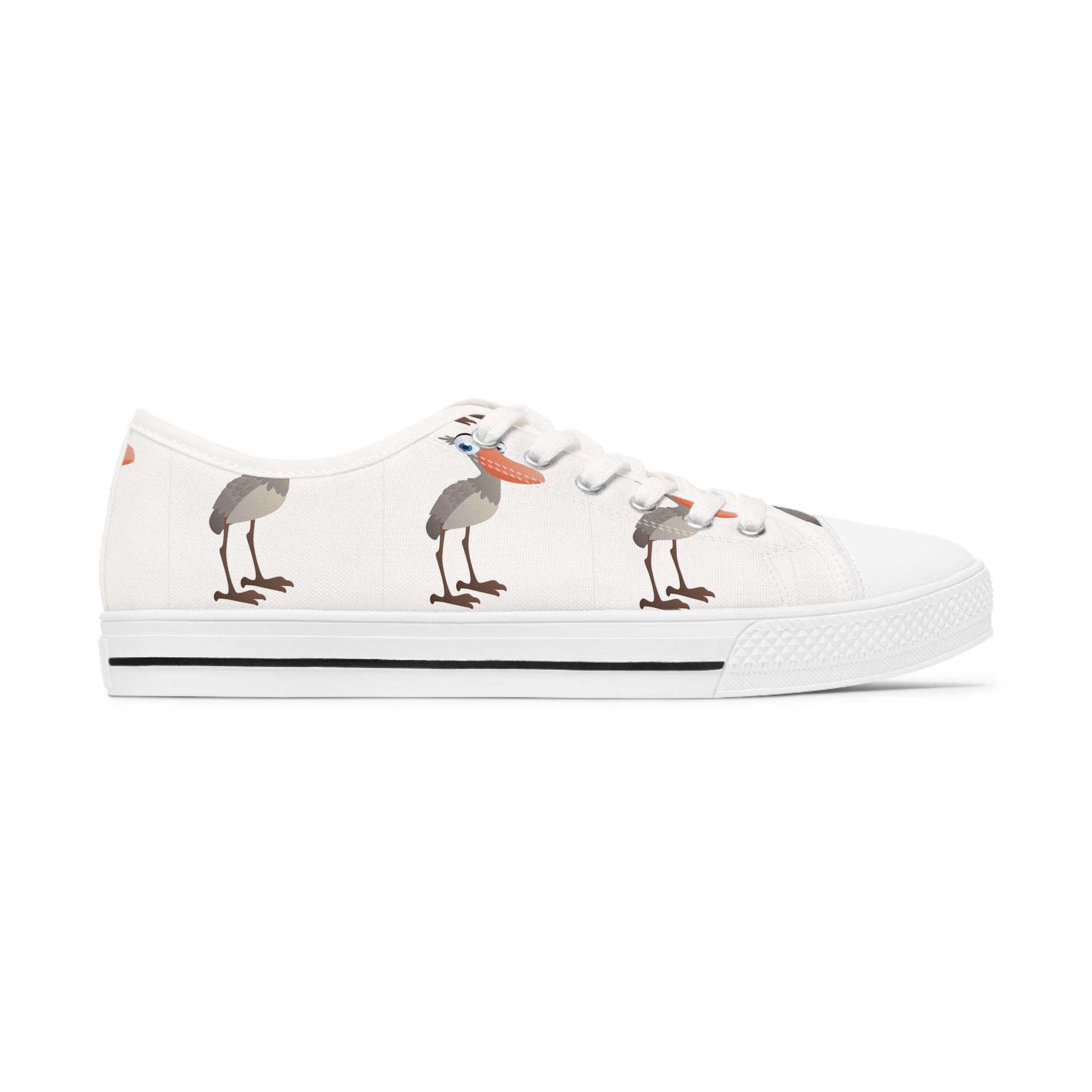 Shoebill Women's Low Top Sneakers in black and white with silver metal eyelets and lace-up closure, showcasing breathable canvas and memory foam insoles.